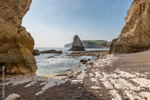 Bild auf Leinwand Low tide at rocky Freshwater Bay on the Isle of Wight, on a sunny spring day