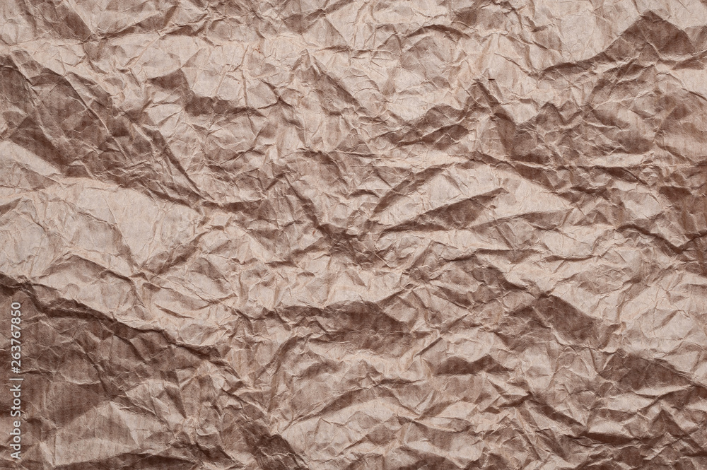 Fototapeta premium Crumpled kraft paper. Texture crumpled recycled old paper.