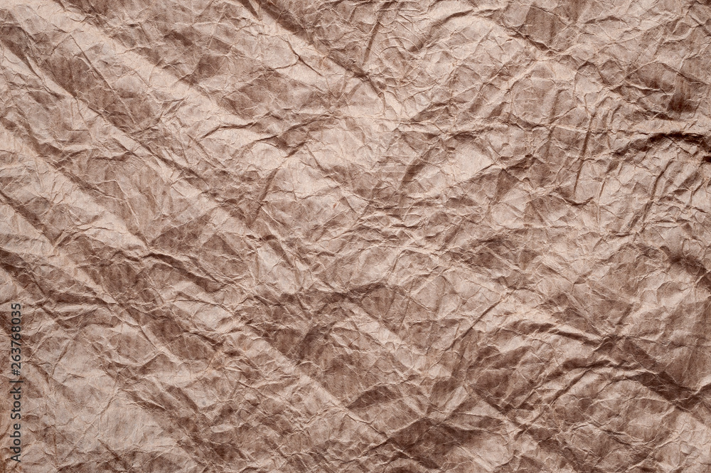 Fototapeta premium Crumpled kraft paper. Texture crumpled recycled old paper.