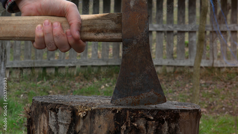 Sledgehammer over the wood block Sledgehammer over the wood block
