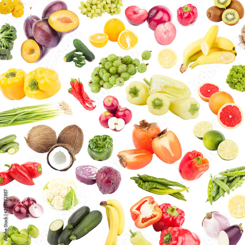 Background made from different colored vegetables and fruits, isolated on white