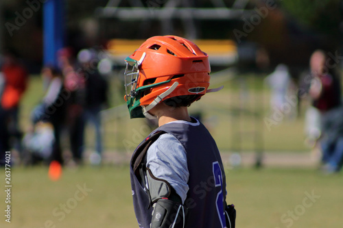 Lacrosse players on the field