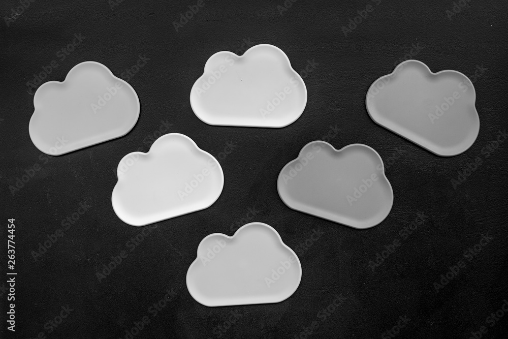 cloud service concept with clouds on black background top view cloud service concept with clouds on black background top view
