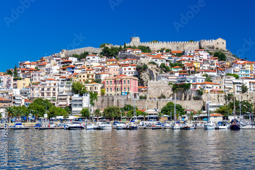 Boats at the Port of Kavala, Eastern Macedonia, Northern Greece and view of the old town in the background