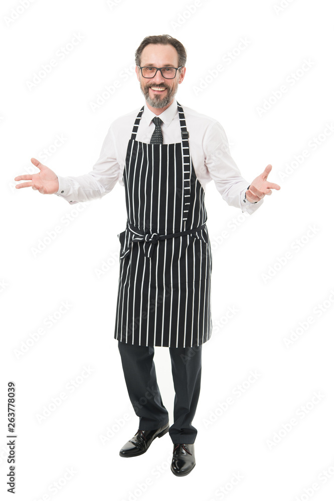 Cook barber or seller wearing apron. Bearded man in apron salesman. Master of household. Home cooking. Household duties. Helpful husband concept. Share household responsibilities. Ready to help Cook barber or seller wearing apron. Bearded man in apron salesman. Master of household. Home cooking. Household duties. Helpful husband concept. Share household responsibilities. Ready to help