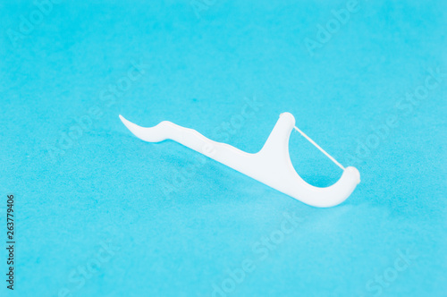 plastic toothpick on a blue background
