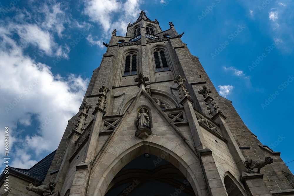 Catholic Church against a cloudy sky Catholic Church against a cloudy sky