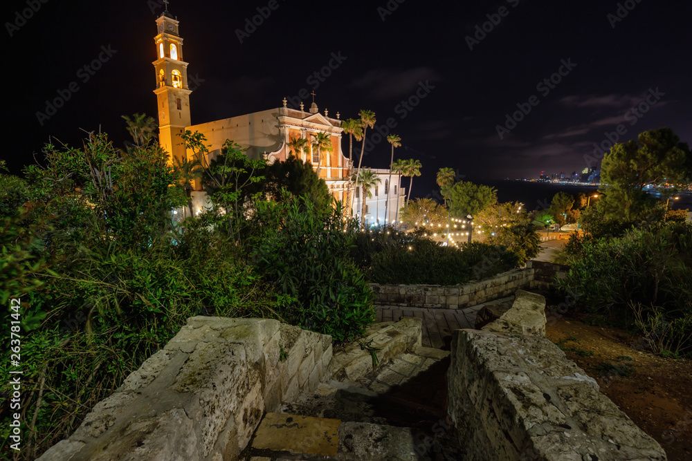 Beautiful view of Abrasha Park with St. Peter's Church in the background during night time. Taken in Old Jaffa, Tel Aviv-Yafo, Israel.
