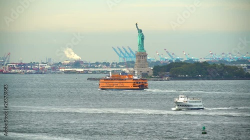 Staten Island ferry passing Statue of Liberty USA photo