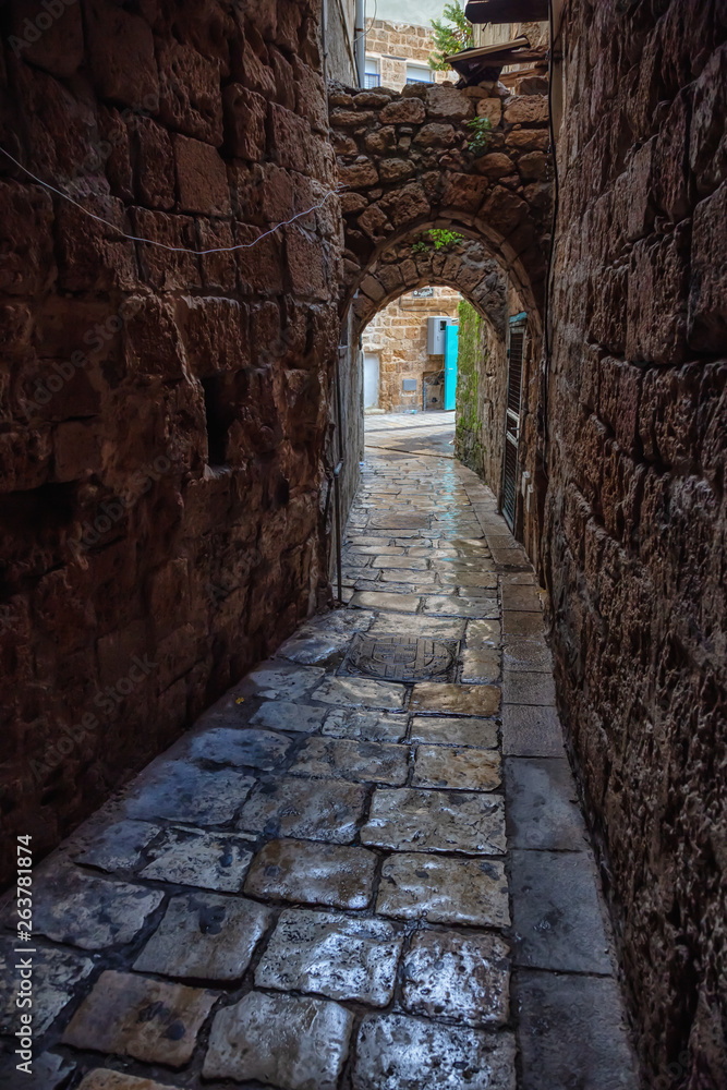 Dark and Narrow streets in the Old City of Akko. Taken in Acre, North District, Israel.