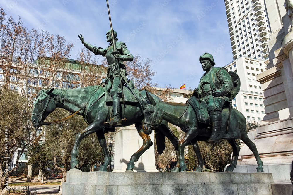 Fototapeta premium Monument to Cervantes and Don Quixote and Sancho Panza at Spain Square in City of Madrid, Spain