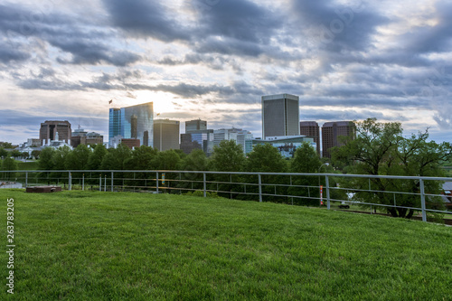 Richmond Virginia skyline during a cloudy sunrise with fast moving clouds