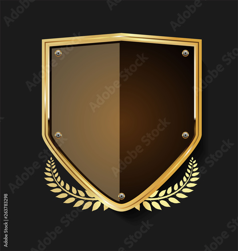 Golden shield and laurel wreath retro design 
