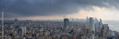 Aerial view of a residential neighborhood in a city during a cloudy sunrise. Taken in Netanya, Center District, Israel. © edb3_16