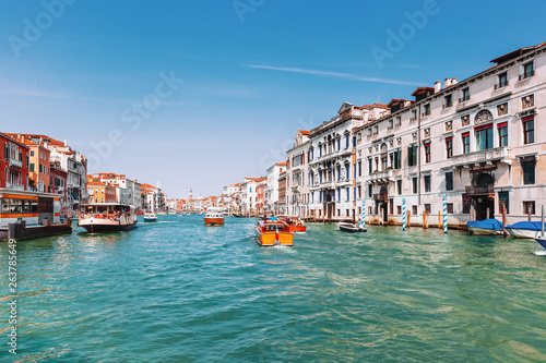 Grand Canal in Venice with water buses and taxes.