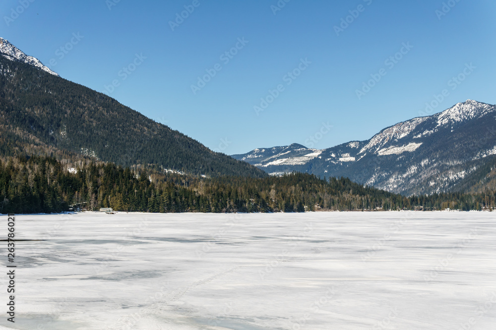 early spring landscape of frozen Three Valley Lake Regional District of Columbia-Shuswap Canada.