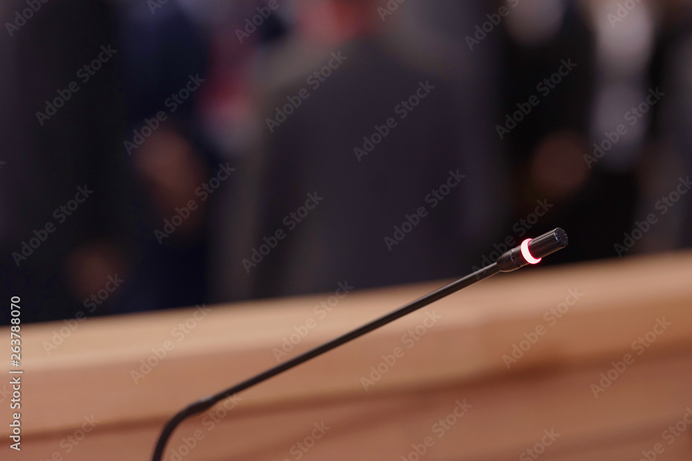 Focus on Microphones in conference room or hall, prepairing for business conference. Focus on Microphones in conference room or hall, prepairing for business conference.