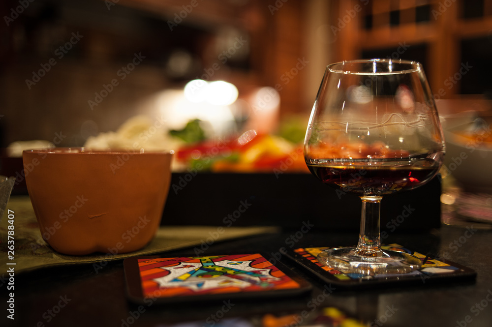 Snifter glass of rum or whiskey Snifter glass of rum or whiskey