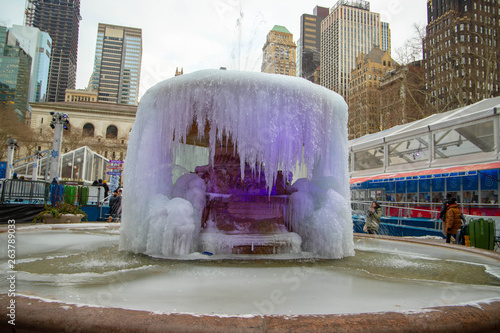  Frozen fountain in the winter time in Bryant park , NY , USA photo