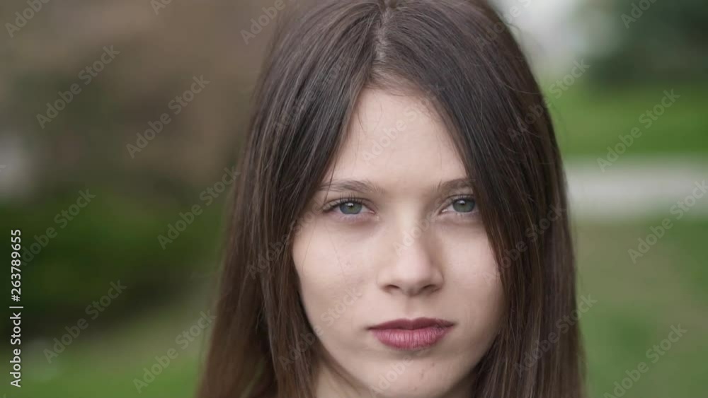 Beautiful Fashionable Young Woman in her twenties, Zoom In, Slow Motion Shot Beautiful Fashionable Young Woman in her twenties, Zoom In, Slow Motion Shot