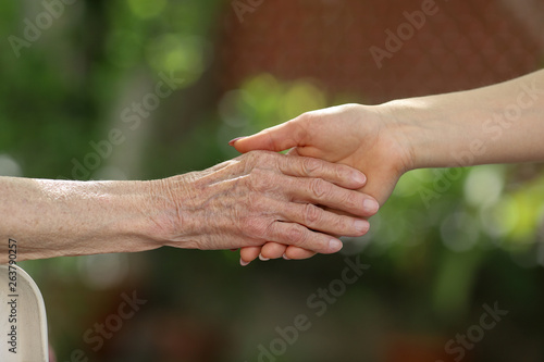 Helping hands, care for the elderly concept