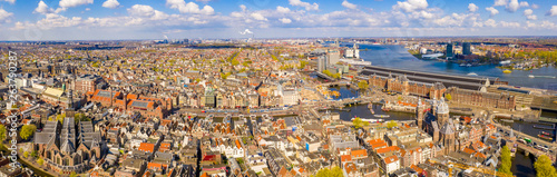 Photography Beautiful aerial Amsterdam view from above with many narrow canals, streets and architectures