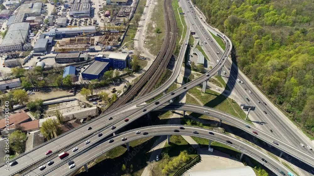 City Traffic on the Bridge and Highway in the spring. Free road for fast driving. City Traffic on the Bridge and Highway in the spring. Free road for fast driving.