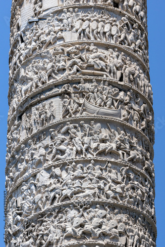 Canvas Print Architectural detail from of ancient Marcus Aurelius Column in front of Palazzo