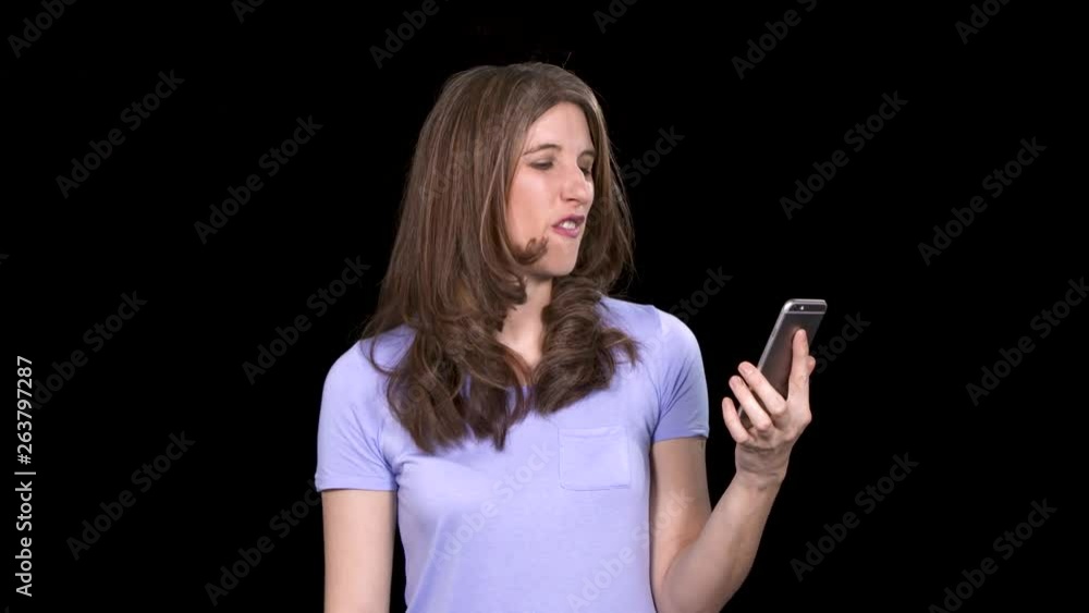 Woman browsing on her cell phone finds exactly what she is looking for Woman browsing on her cell phone finds exactly what she is looking for