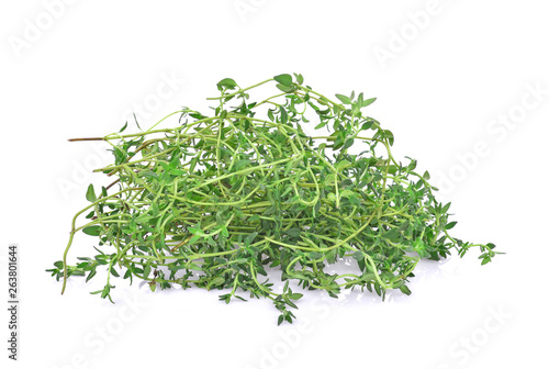 Thyme fresh herb closeup isolated on white background.
