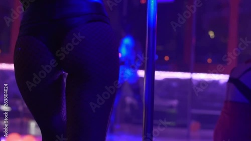 close up of a sexy lap dancer dancing in a night club photo