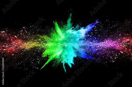 abstract colored dust explosion on a black background.abstract powder splatted background 