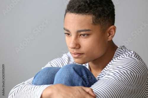 Sad African-American teenag...