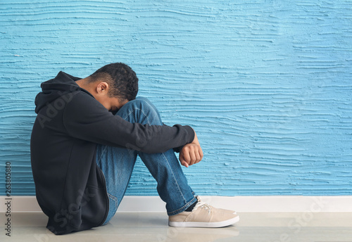 Sad African-American teenag...