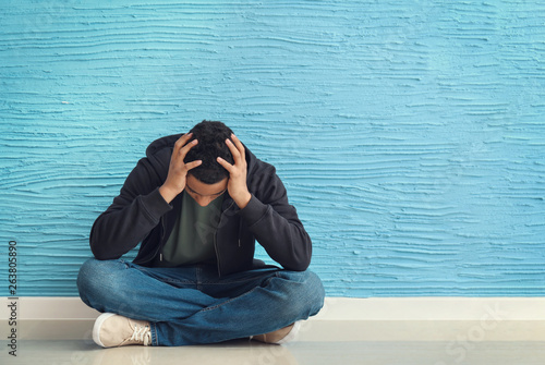 Sad African-American teenag...