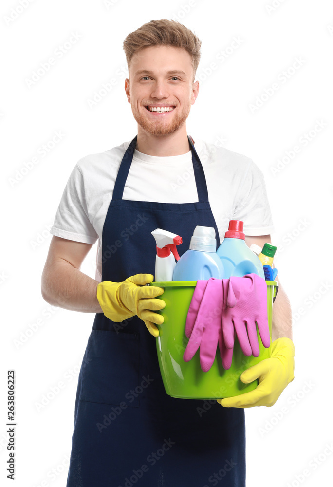 Portrait of male janitor with cleaning supplies on white background Portrait of male janitor with cleaning supplies on white background