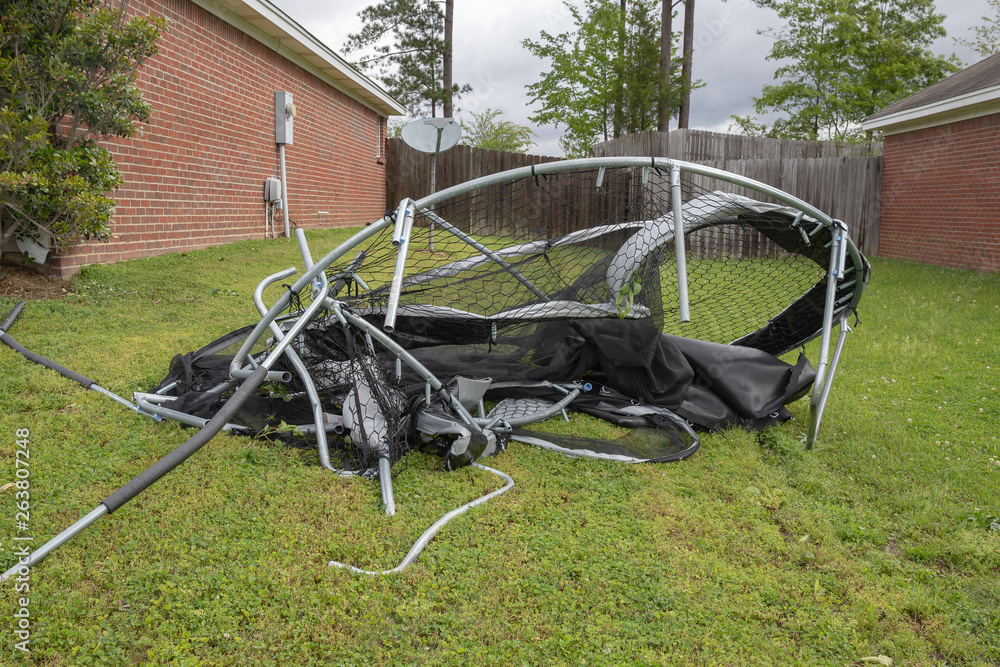 Trampoline twisted and mangled after storm and tornado Stock Photo | Adobe  Stock