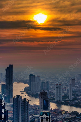 romantic sunset over Bangkok with view of the Chao Phraya river