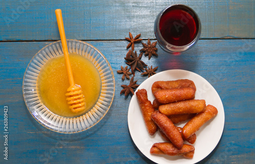 pestiños with port and honey typical of Spanish gastronomy photo