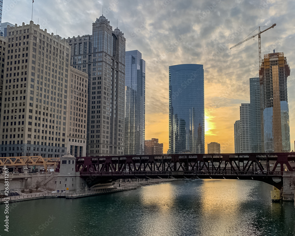 Sunset over Chicago River with altocumulus cloudscape Sunset over Chicago River with altocumulus cloudscape