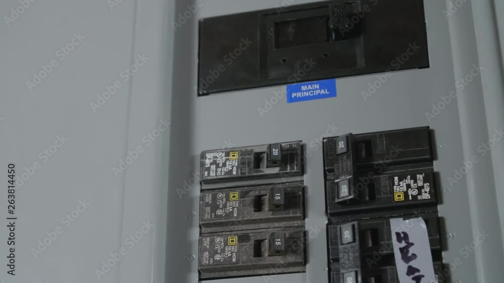 Switches in Circuit Breaker Box CLOSE UP SLIDE LEFT Switches in Circuit Breaker Box CLOSE UP SLIDE LEFT