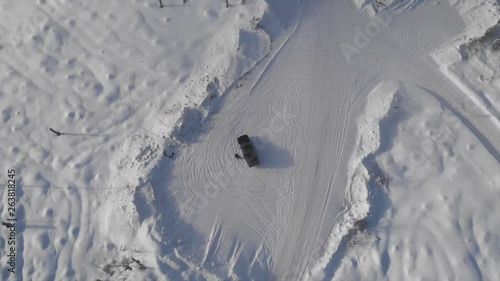 Panning over a car/driver. winter. Trysil, Norway photo