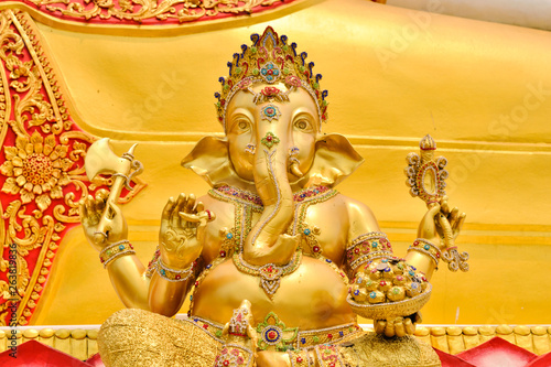 Statue of Lord Ganesh golden color so that people who profess to worship.