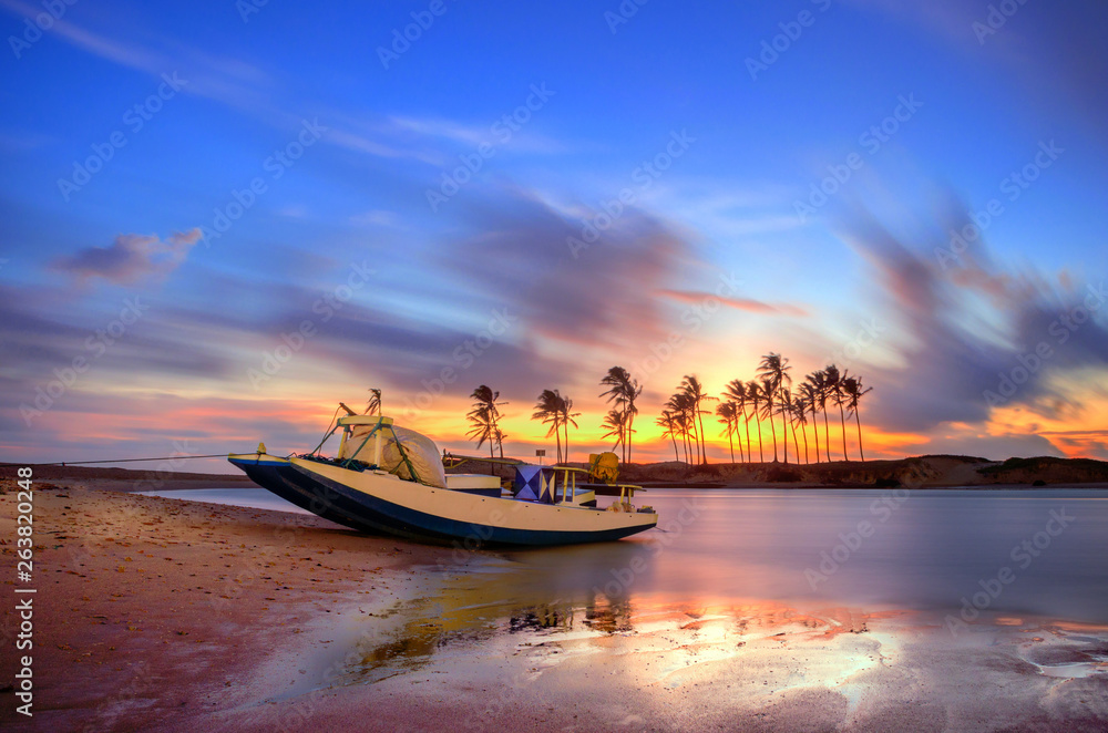 Fototapeta premium boat at sunset