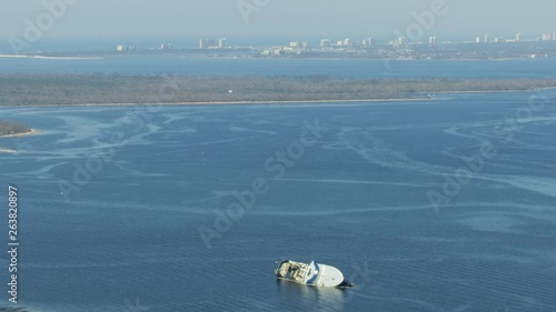 Aerial view of capsized trawler after severe storm  photo