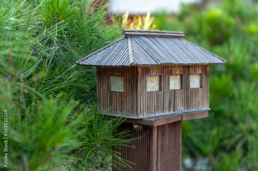 Korean wooden lamp in garden of old house in an ancient village in Jeonju, South Korea Korean wooden lamp in garden of old house in an ancient village in Jeonju, South Korea