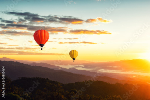 Sunset Mountain View has a floating balloon in the sky. © Sky Stock