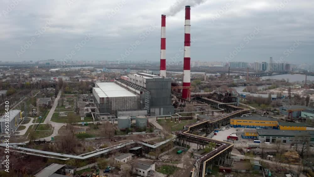 Aerial view, power plant near Dnieper river outside of Kiev with large chimneys. Aerial view, power plant near Dnieper river outside of Kiev with large chimneys.