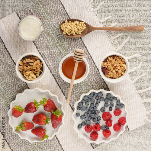 Series about granola, berry and greek yogurt suitable for a healthy breakfast, snack or dessert.