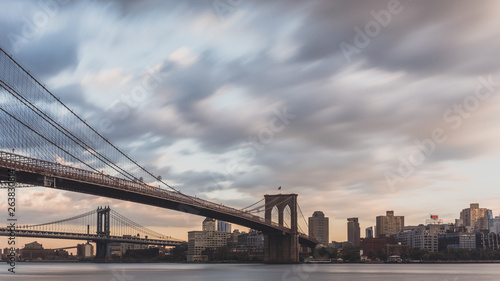 Brooklyn and Manhattan bridge over East River with skyline of Brooklyn, viewed from Manhattan, New York, USA